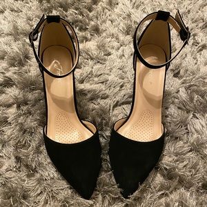 Black pointed toe heels